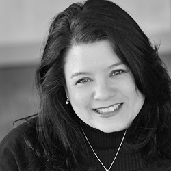 Julie Haggerty BW black and white photo of a woman smiling with dark hair